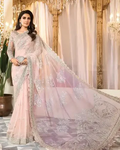 Maria B Premium Collection Net Heavy Embroidered Saari Suit with spengle work, embroidered borders, and satin silk trouser – Pakistani wedding and festive wear 2025