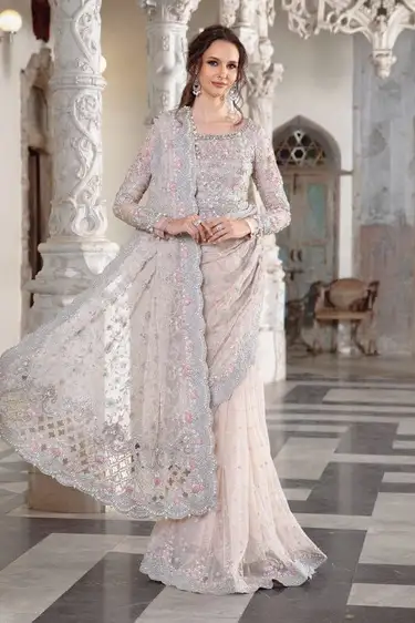 Maria B Exclusive Saree – Master Blaster Edition 2025 Maria B embroidered net saree with adda work, tassels, and silk petticoat – Exclusive Master Blaster edition 2025.